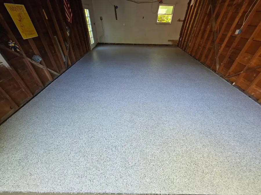 Garage after: light gray flake epoxy floor