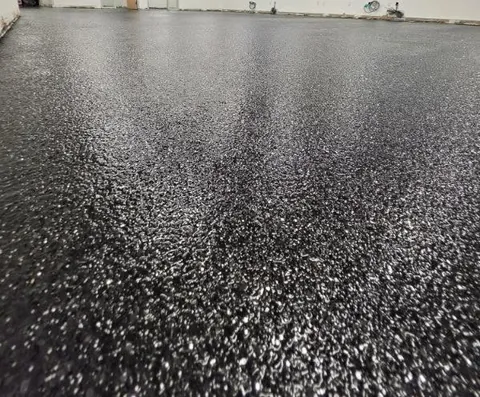 After: carbon flake floor in the same warehouse office